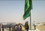 برافراشتن پرچم حرم امام رضا (ع) در شهرستان دیر